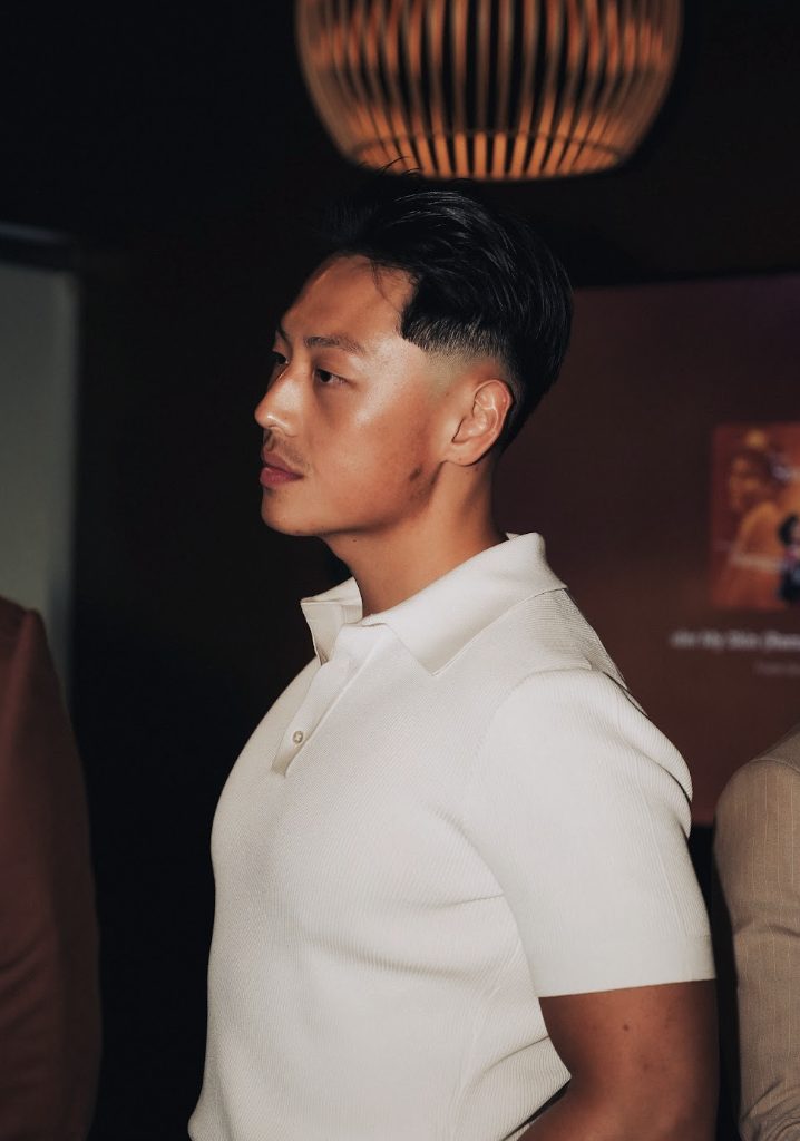 A member in profile at an evening event